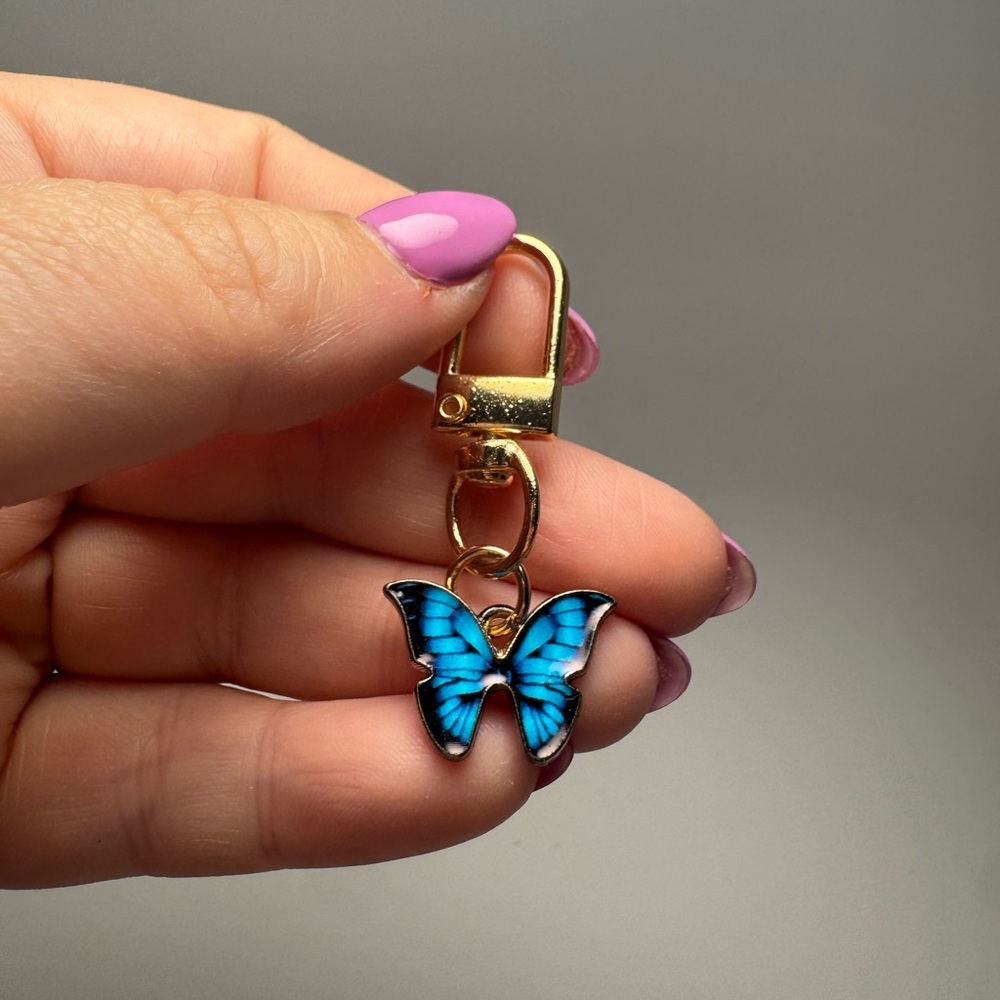 Ulysses Butterfly Blue & Black Multicolor Bag Charm/Key Chain Enamel & Gold